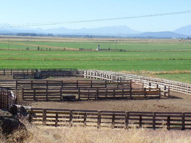 view of community featuring a rural view and a mountain view