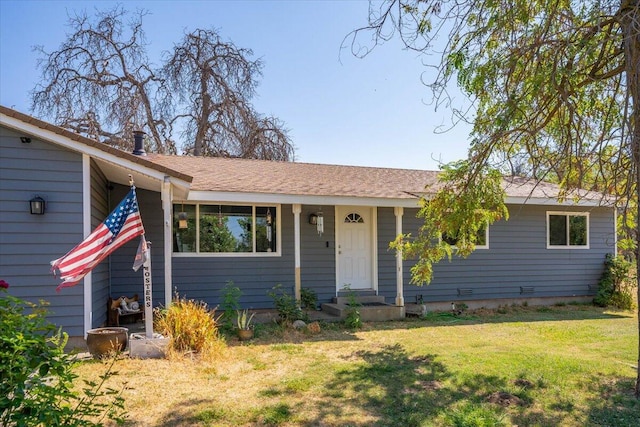 view of front facade featuring a front yard