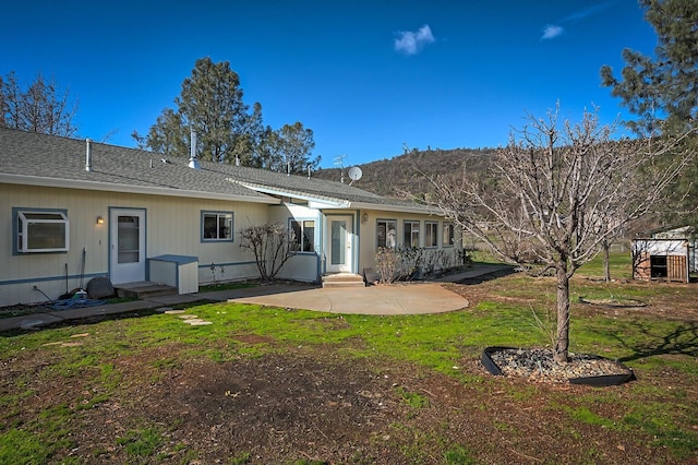 back of house featuring a patio area