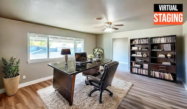 office area with hardwood / wood-style floors and ceiling fan