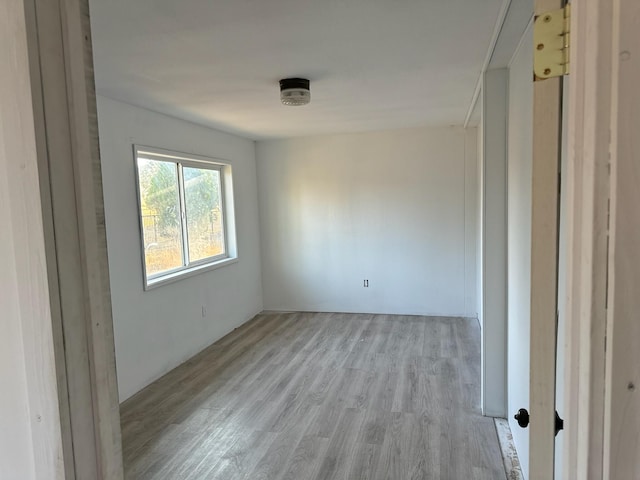 empty room with light wood-type flooring