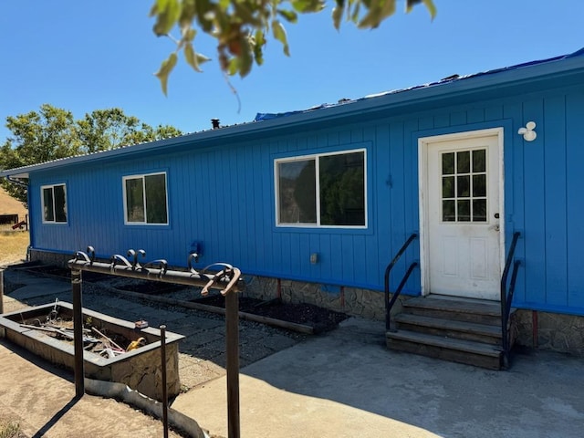 rear view of house featuring a patio area