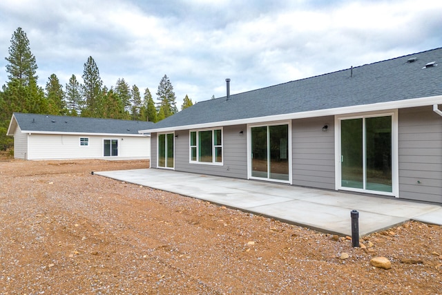 back of house featuring a patio area