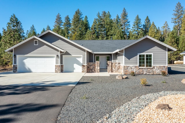 ranch-style home featuring a garage