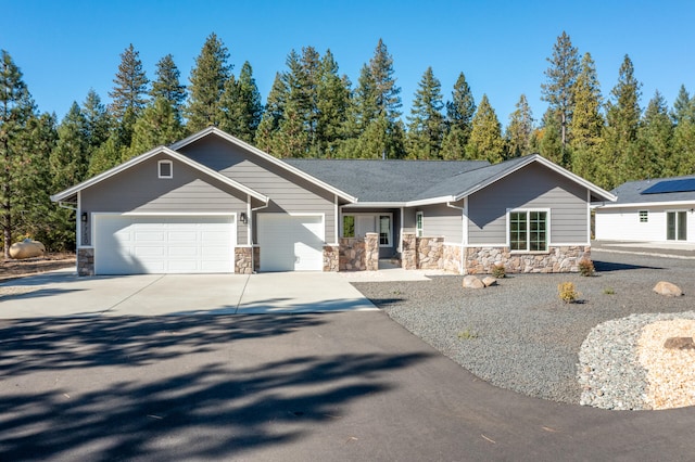 single story home with a garage