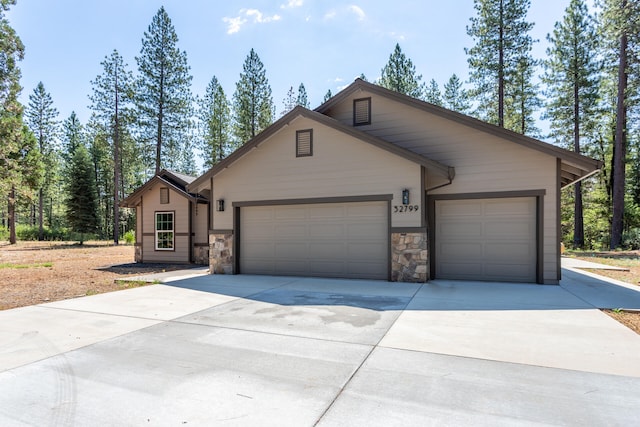 ranch-style house featuring a garage