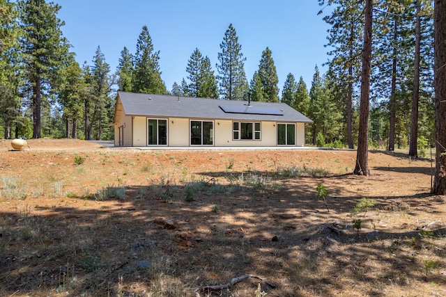 rear view of house featuring a patio area