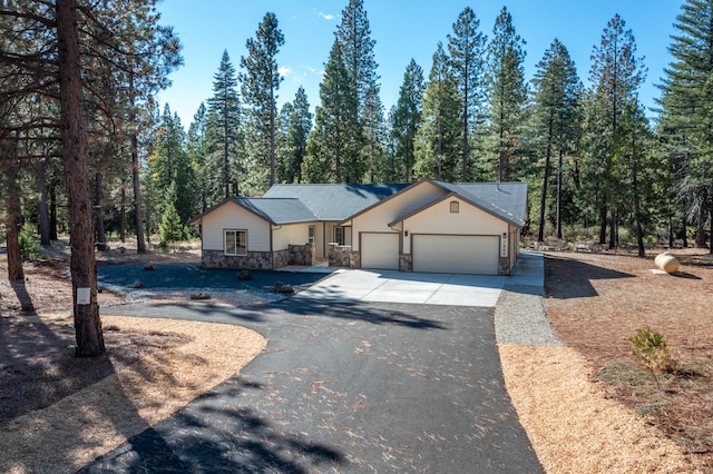 single story home with a garage