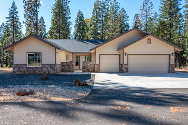 ranch-style home featuring a garage