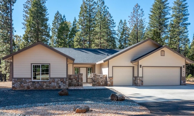 single story home featuring a garage