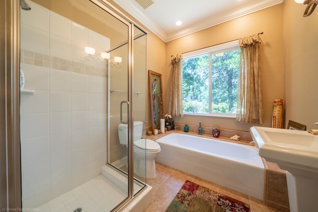 bathroom with plus walk in shower, crown molding, toilet, and tile patterned floors