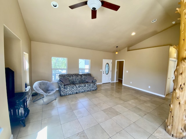 living area featuring baseboards, lofted ceiling, light tile patterned floors, recessed lighting, and a ceiling fan