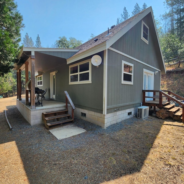 exterior space with a patio area and central air condition unit