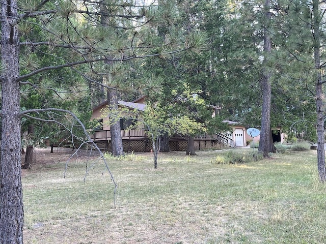 view of yard featuring a deck