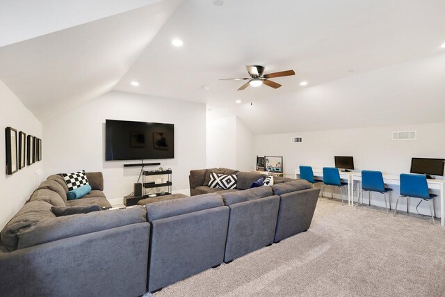 living room with ceiling fan, light carpet, and lofted ceiling