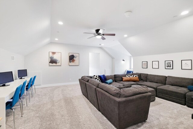 carpeted living room featuring ceiling fan and lofted ceiling