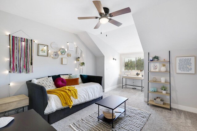 carpeted bedroom featuring ceiling fan and lofted ceiling