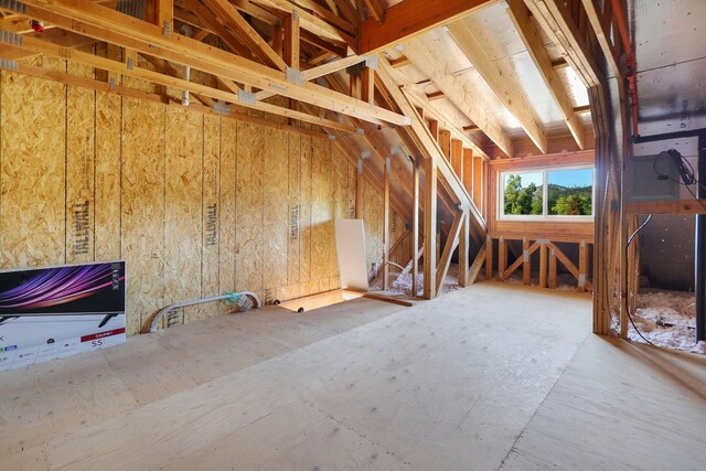 interior space featuring lofted ceiling