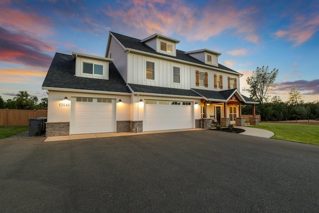 view of front of property featuring a garage