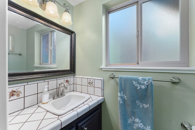 bathroom featuring backsplash and vanity