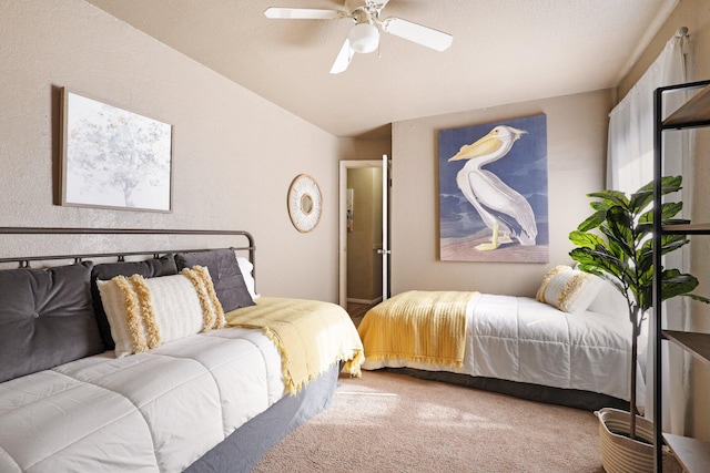 bedroom featuring ceiling fan, a textured ceiling, and carpet floors