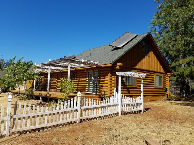 view of log cabin