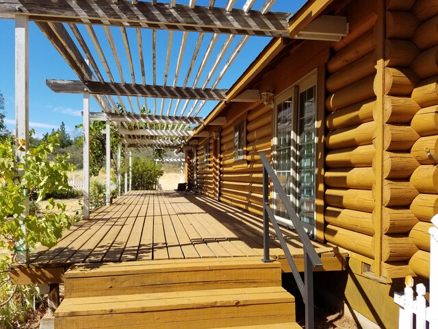7414 Albers Forest Dr, Shingletown, CA 96088 - wooden deck with a pergola