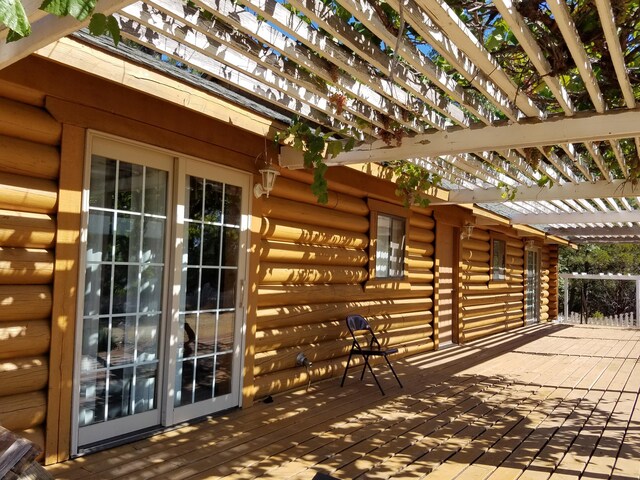 view of patio / terrace featuring a pergola and a wooden deck