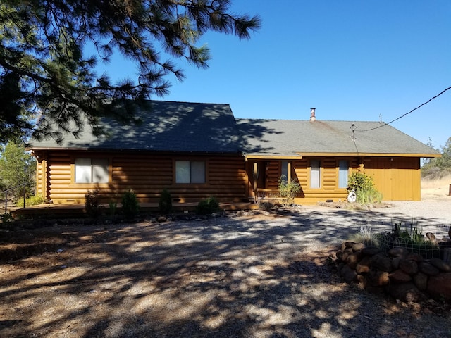 view of log cabin