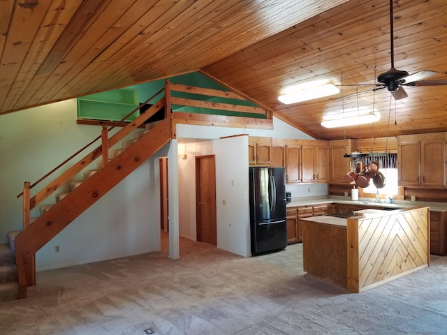 7414 Albers Forest Dr, Shingletown, CA 96088 - kitchen featuring light countertops, lofted ceiling, light colored carpet, ceiling fan, and freestanding refrigerator