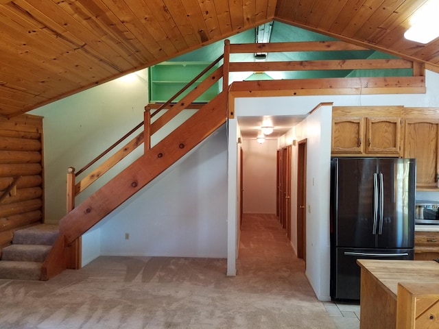 7414 Albers Forest Dr, Shingletown, CA 96088 - interior space with wood ceiling, freestanding refrigerator, butcher block countertops, stainless steel microwave, and light colored carpet