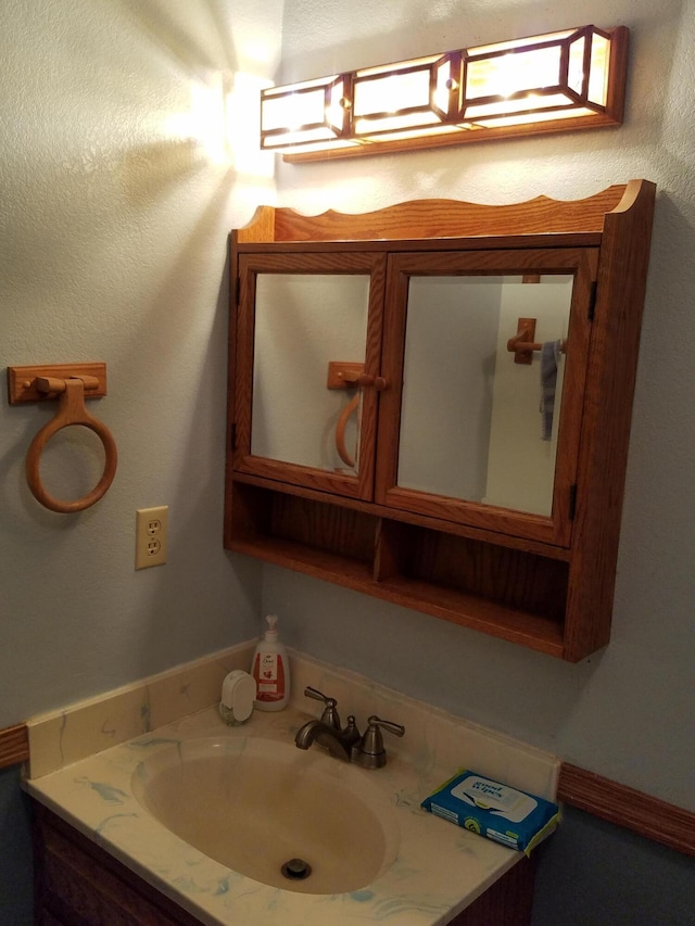 7414 Albers Forest Dr, Shingletown, CA 96088 - bathroom with a textured wall and vanity