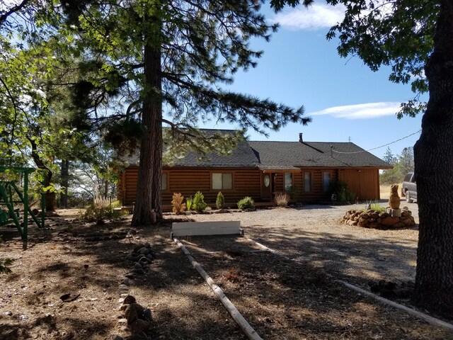 7414 Albers Forest Dr, Shingletown, CA 96088 - exterior space featuring roof with shingles