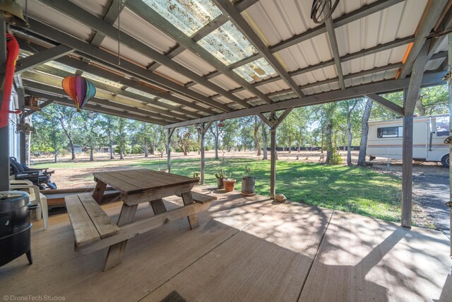 exterior space featuring a wooden deck