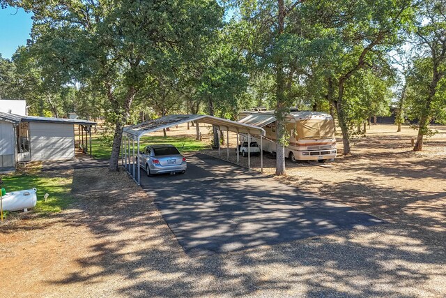 view of front of property with a carport