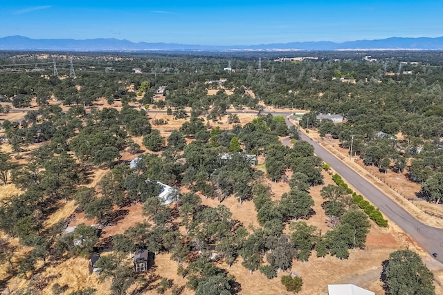 drone / aerial view featuring a mountain view