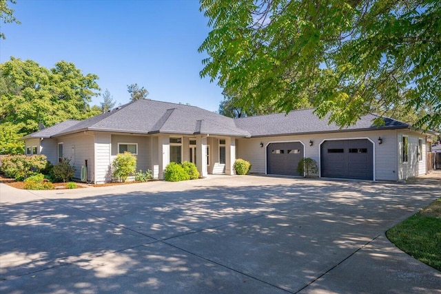 single story home with a garage