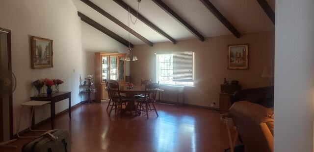 dining area with beam ceiling, high vaulted ceiling, and dark wood-type flooring