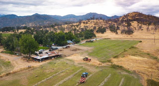 aerial view with a mountain view and a rural view