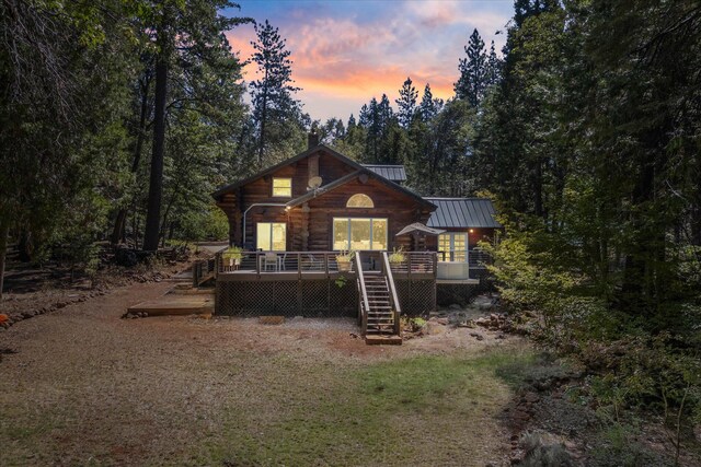 exterior space featuring a wooden deck