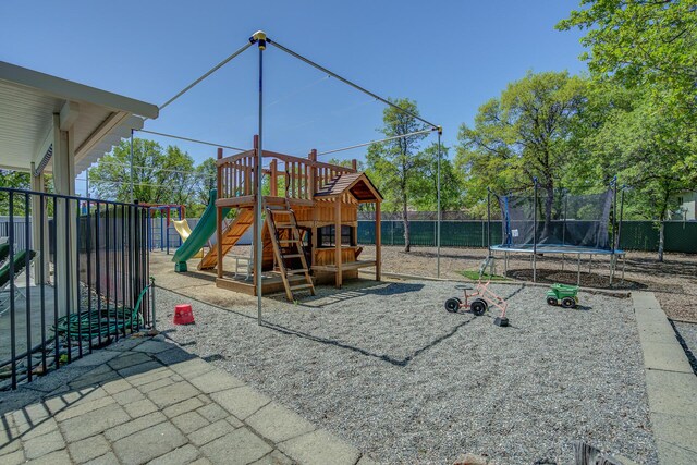 view of playground featuring a trampoline