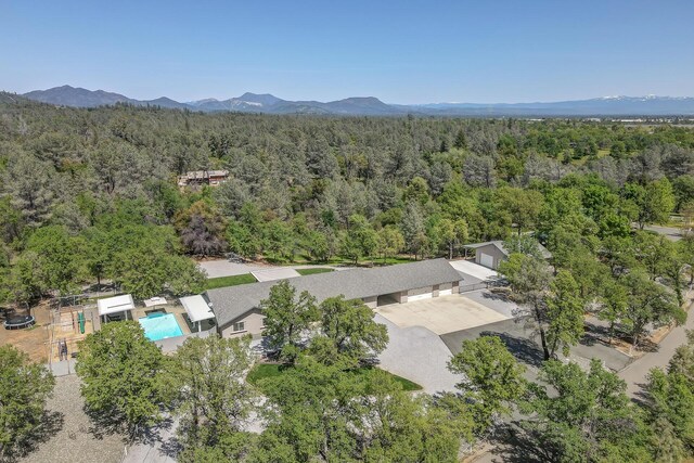 drone / aerial view featuring a mountain view