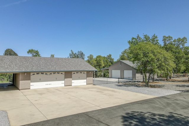 view of property exterior featuring a garage