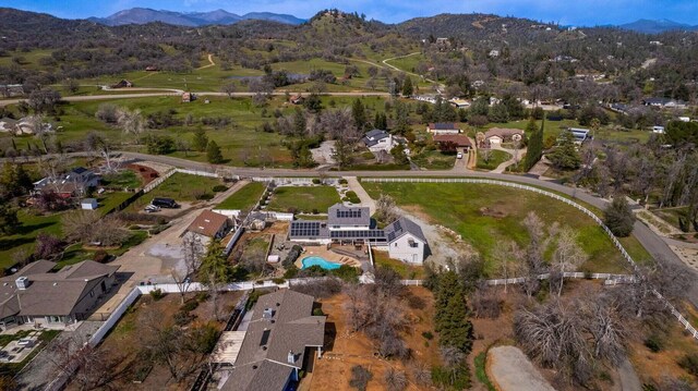 drone / aerial view featuring a mountain view