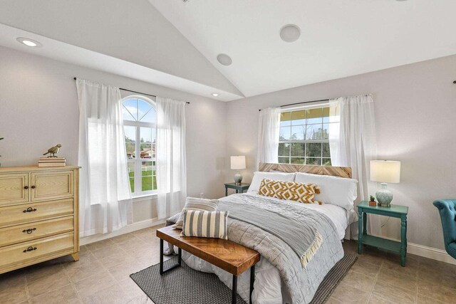 bedroom featuring lofted ceiling