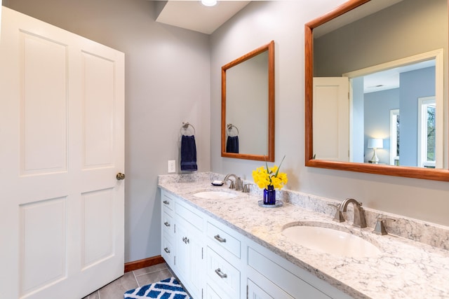 bathroom featuring tile patterned floors and vanity