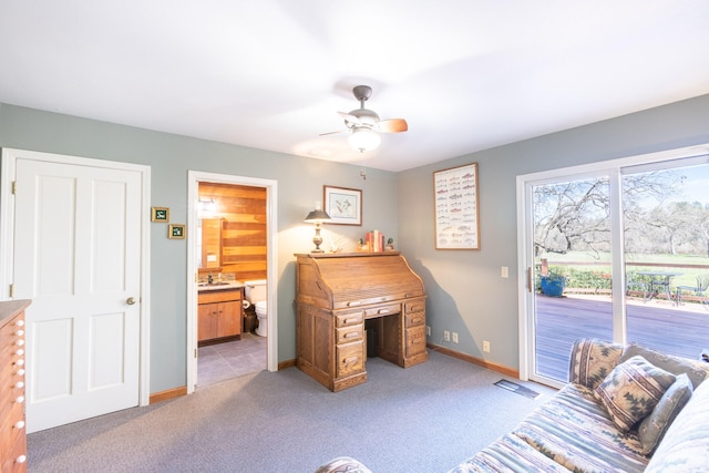 carpeted bedroom featuring ceiling fan, access to exterior, and ensuite bathroom