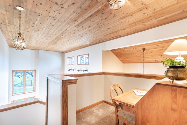 interior space featuring wooden ceiling and vaulted ceiling