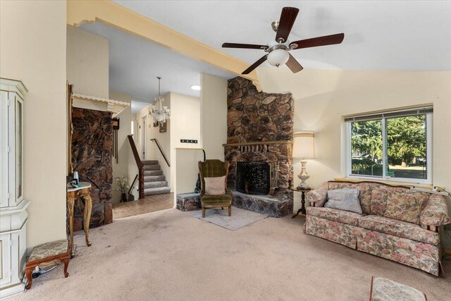 living room with carpet flooring, ceiling fan, high vaulted ceiling, and a fireplace