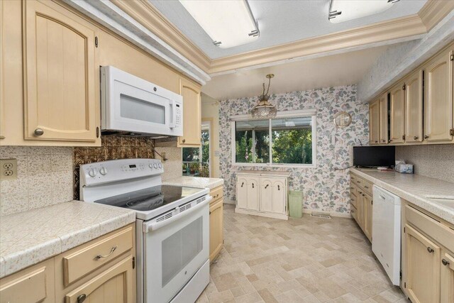 kitchen with crown molding, white appliances, backsplash, and hanging light fixtures